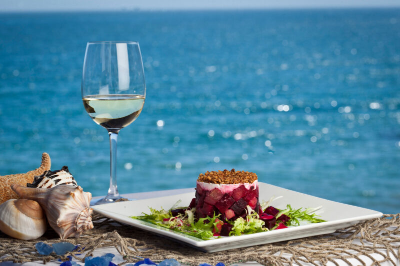 Moonshadows Malibu - Roasted Organic Red & Yellow Beet Salad, Goat Cheese, Beet Vinaigrette, Balsamic Syrup & a glass of white wine